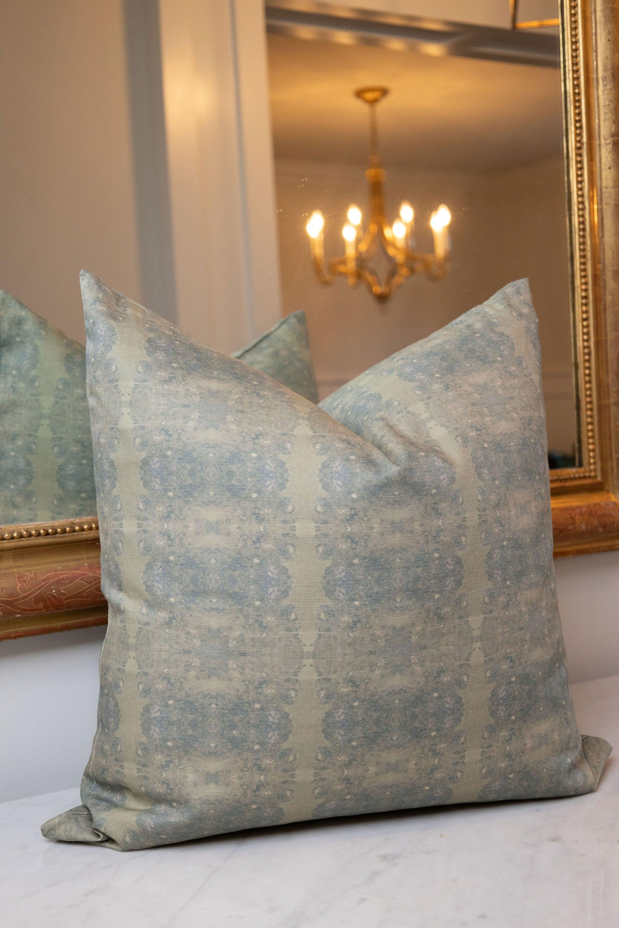 Centerpiece Rosemary luxury pillow featuring an abstract floral pattern in soft green tones, handcrafted in England for layered living rooms, bedrooms, and designer-curated interiors.