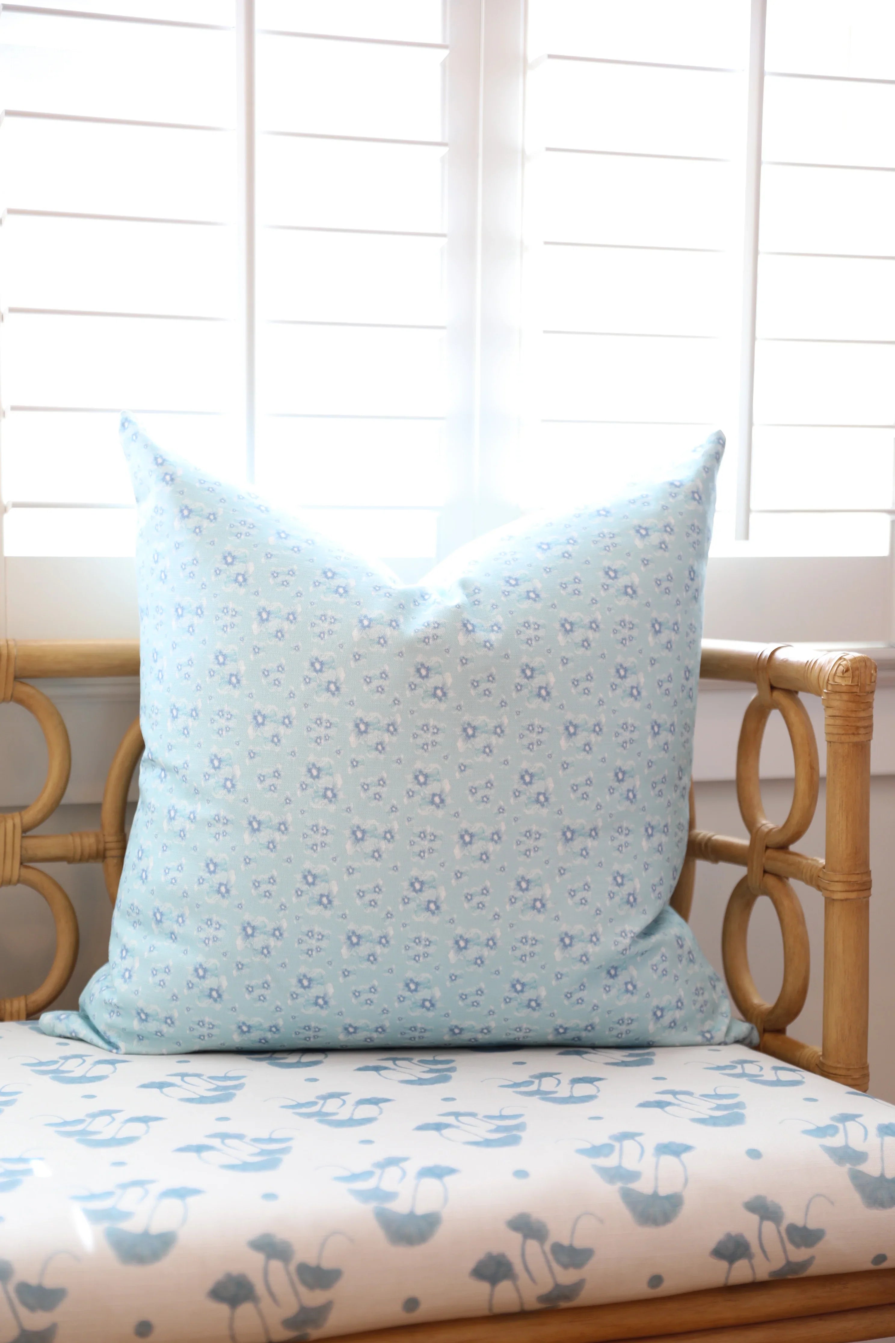 Luxury floral decorative pillow inspired by English cottage gardens with soft botanical detail and layered texture, designed for modern traditional interiors, cozy bedrooms, collected living spaces, and timeless cottage-style homes. Sustainably printed and handcrafted in England by Truett Designs.