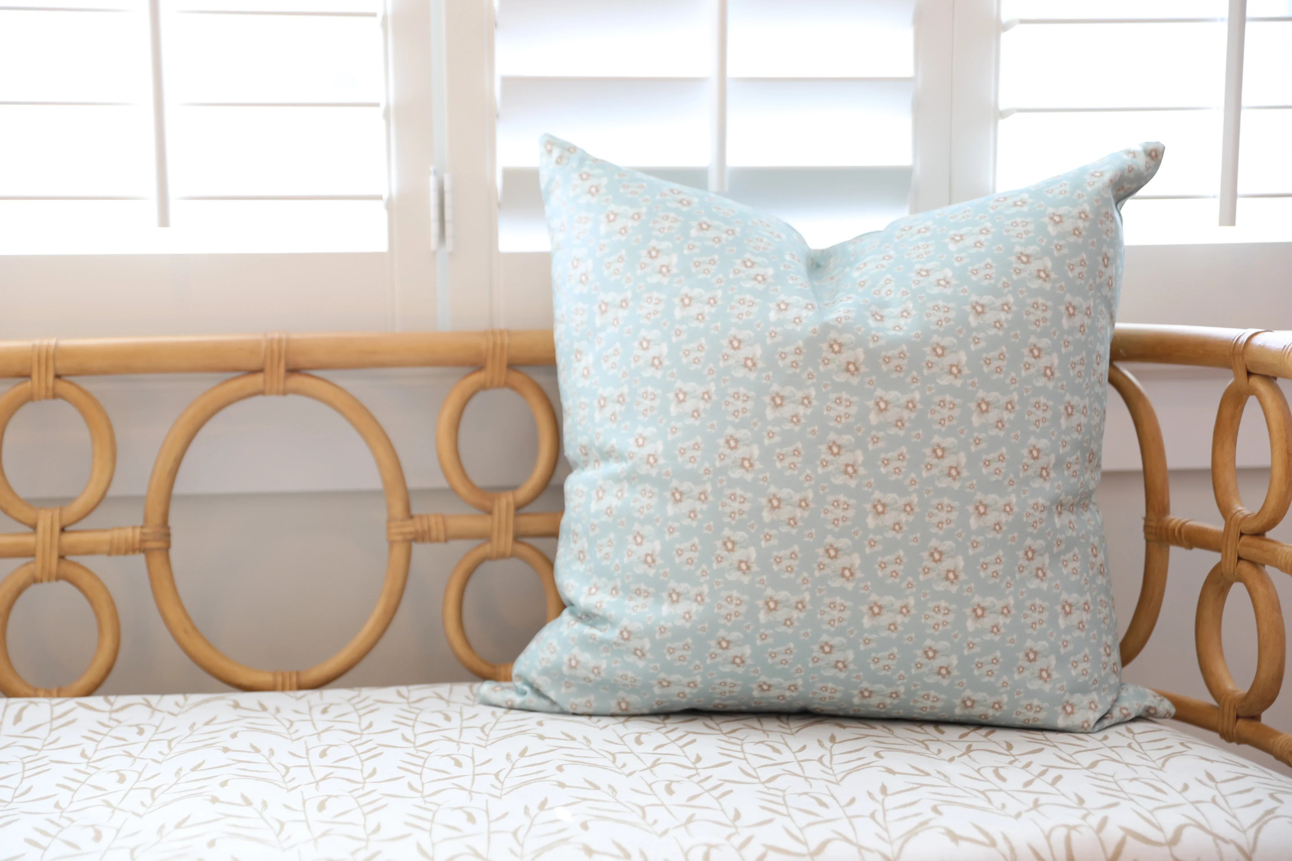 Luxury floral decorative pillow inspired by English cottage gardens with soft botanical detail and layered texture, designed for modern traditional interiors, cozy bedrooms, collected living spaces, and timeless cottage-style homes. Sustainably printed and handcrafted in England by Truett Designs.