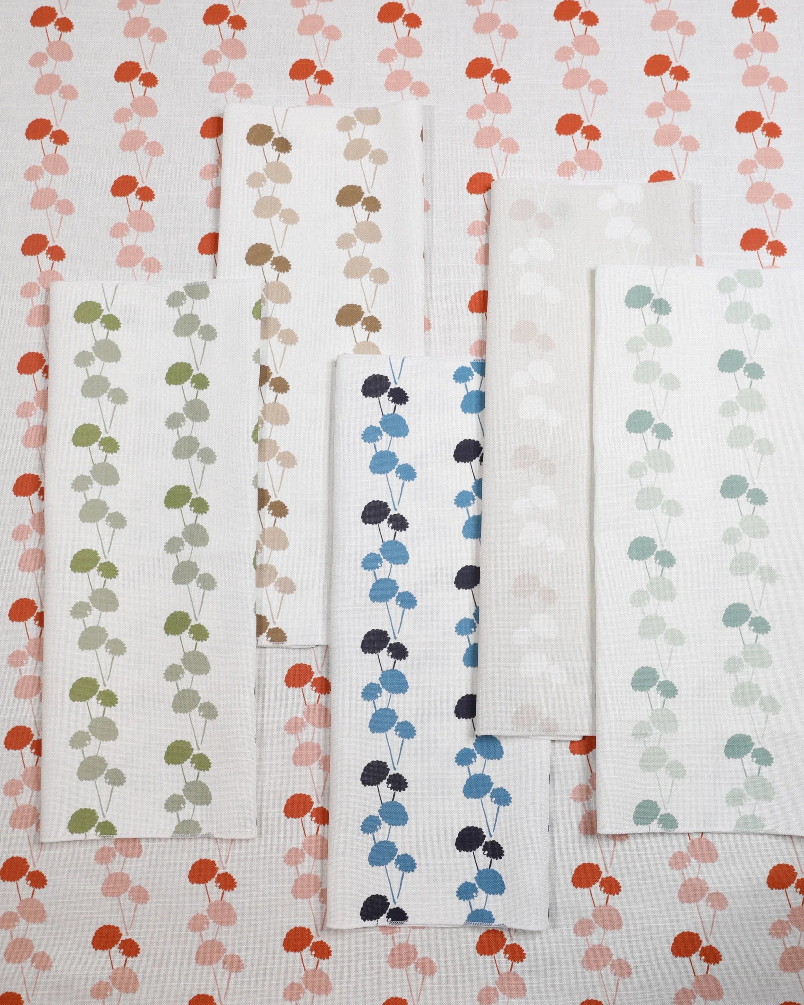 Luxury linear floral fabric with elegant dahlia vine pattern inspired by English gardens, ideal for drapery, upholstery, and refined layered interiors.