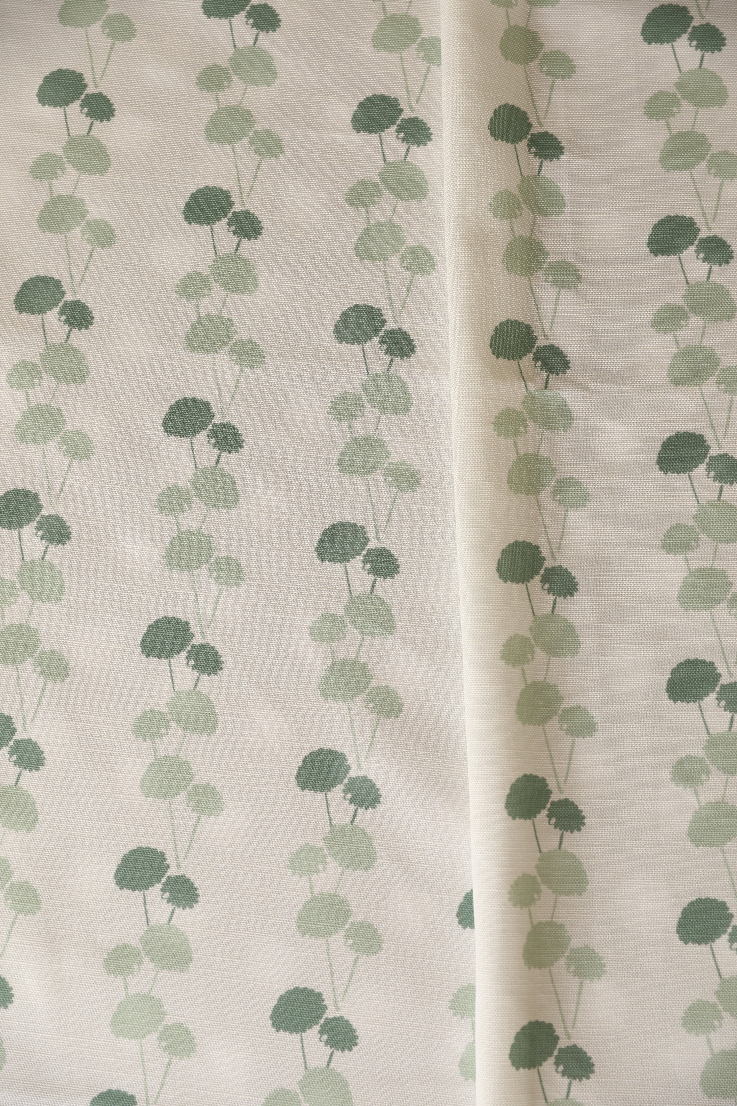 Luxury linear floral fabric with elegant dahlia vine pattern inspired by English gardens, ideal for drapery, upholstery, and refined layered interiors.