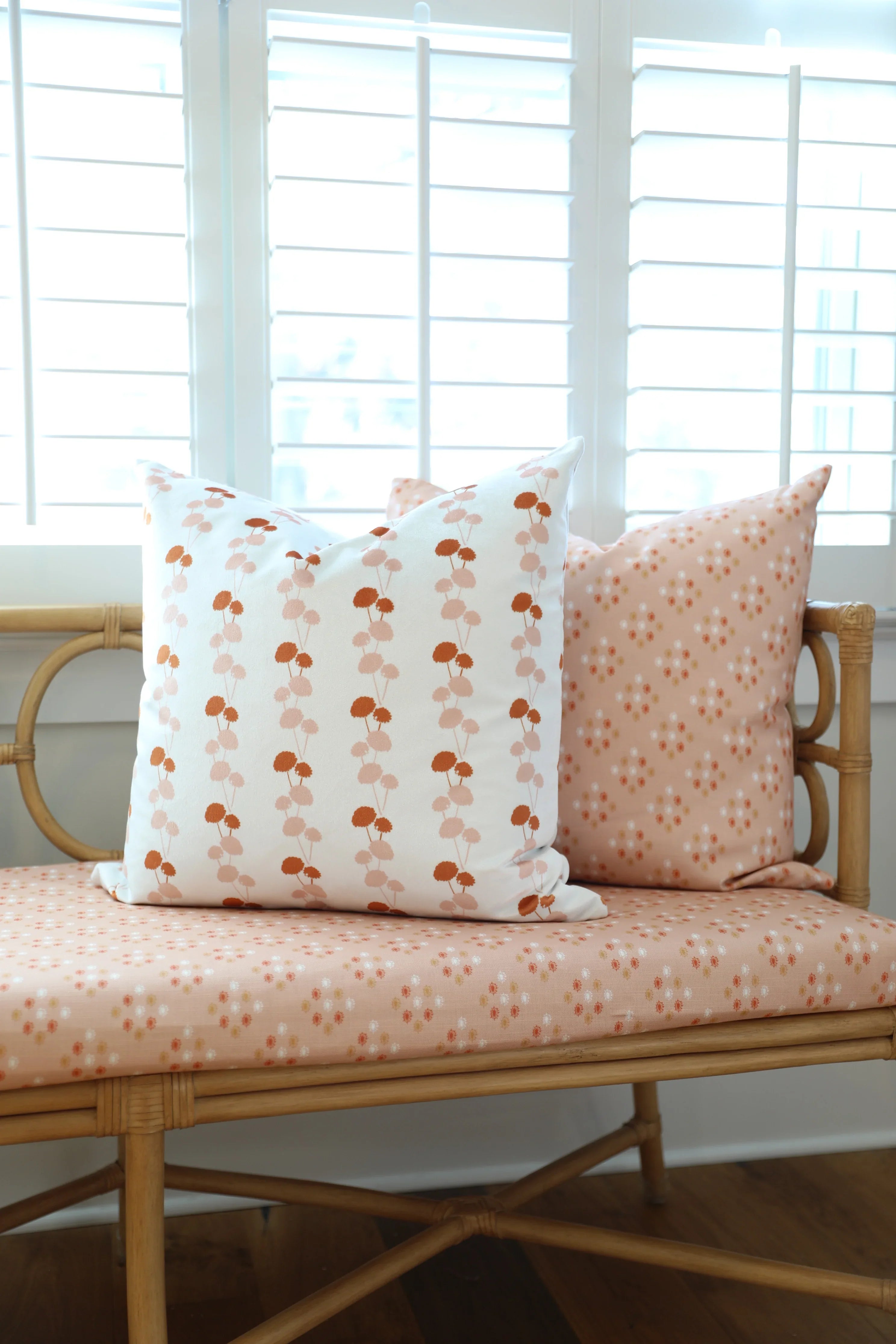 Luxury floral decorative pillow featuring the Dahlia Vine pattern, inspired by blooming dahlias and winding vines, for modern traditional and collected interiors.