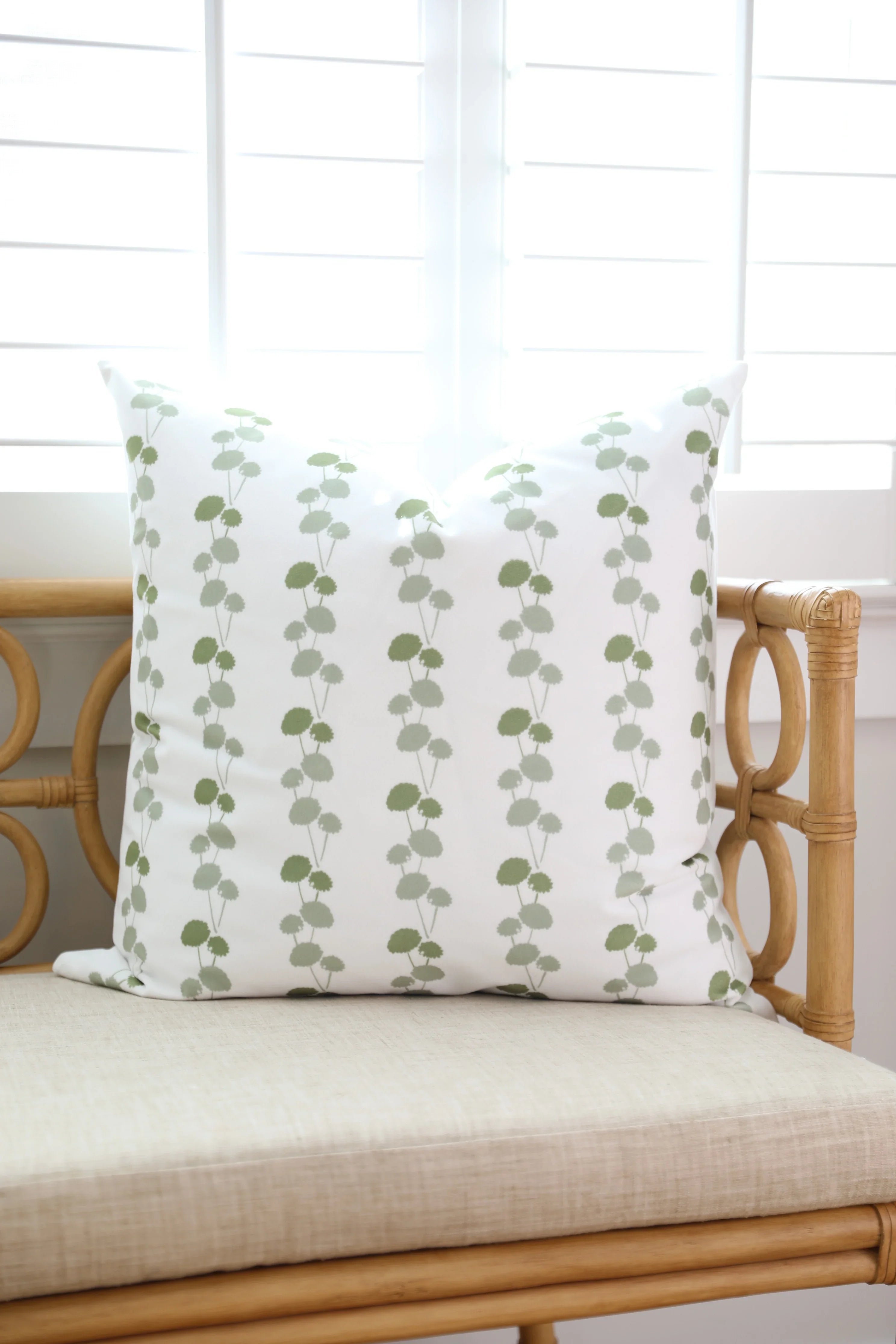 Luxury floral decorative pillow featuring the Dahlia Vine pattern, inspired by blooming dahlias and winding vines, for modern traditional and collected interiors.