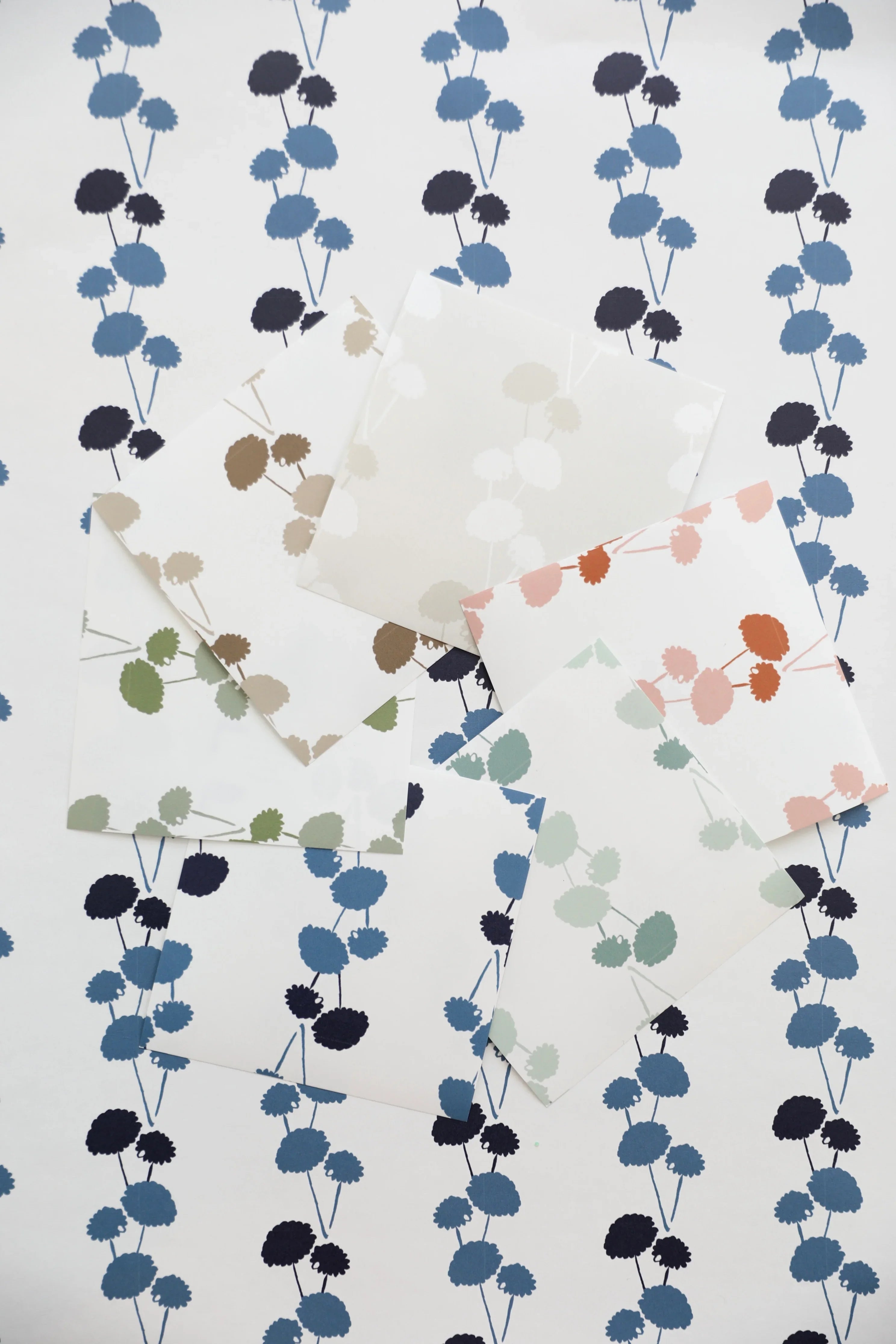 Luxury botanical and floral wallpaper featuring an elegant linear dahlia vine pattern inspired by English gardens, designed for modern traditional interiors, powder rooms, bedrooms, dining spaces, and layered luxury homes. Sustainably printed in England by Truett Designs.