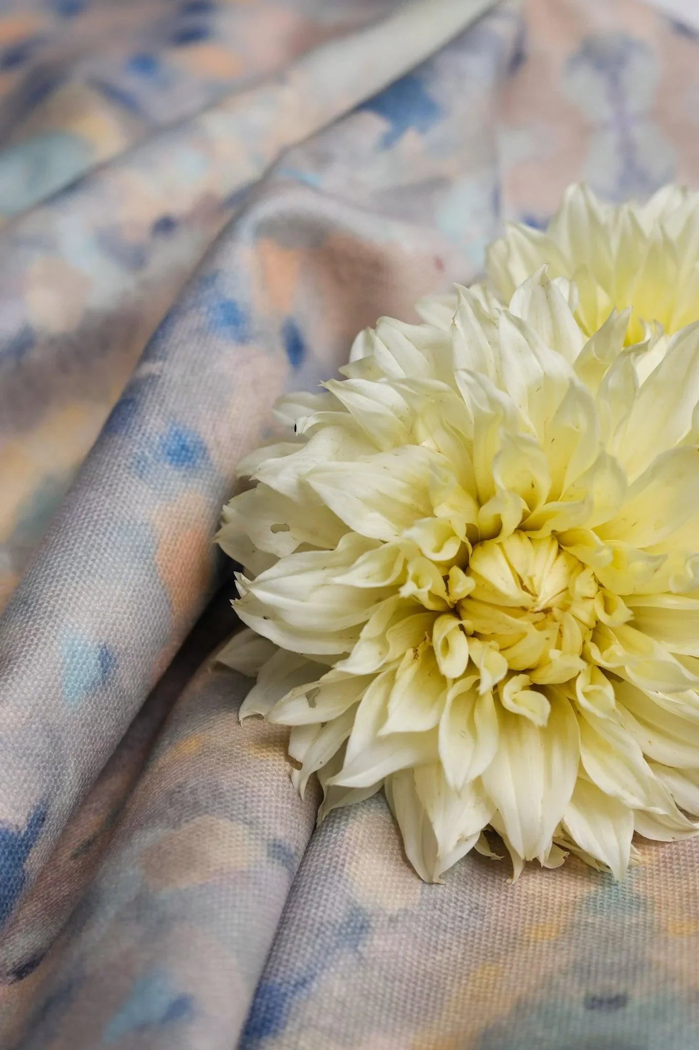 Luxury abstract fabric with layered organic movement inspired by Colorado River rock, designed for upholstery, drapery, bedding, and modern traditional interiors. Small-scale repeat with soft tonal variation and natural texture for collected luxury homes. Sustainably printed and handcrafted in England by Truett