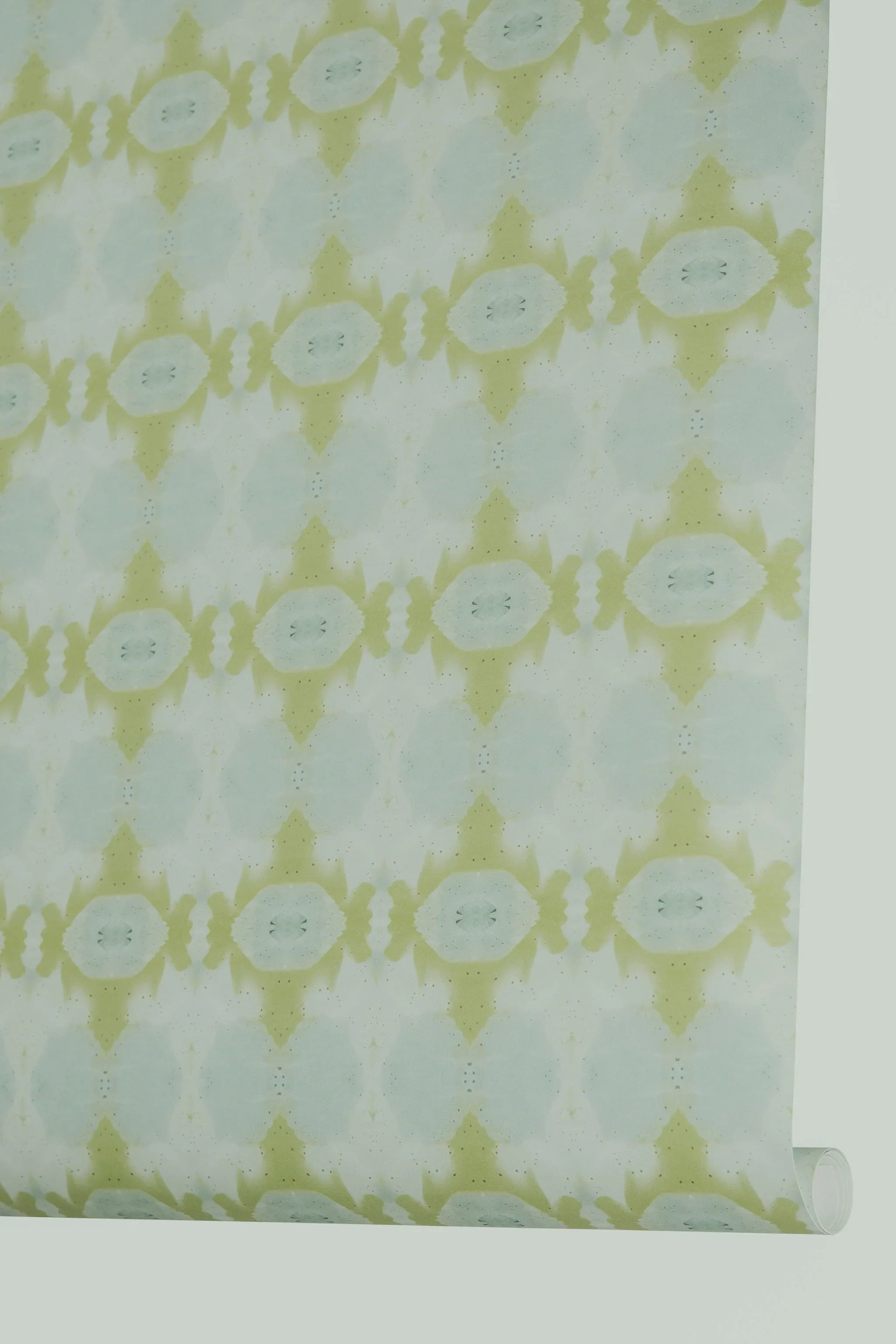 Designer abstract wallpaper in chartreuse green and soft blue with an organic geometric motif, ideal for modern traditional interiors, statement walls, and layered homes.