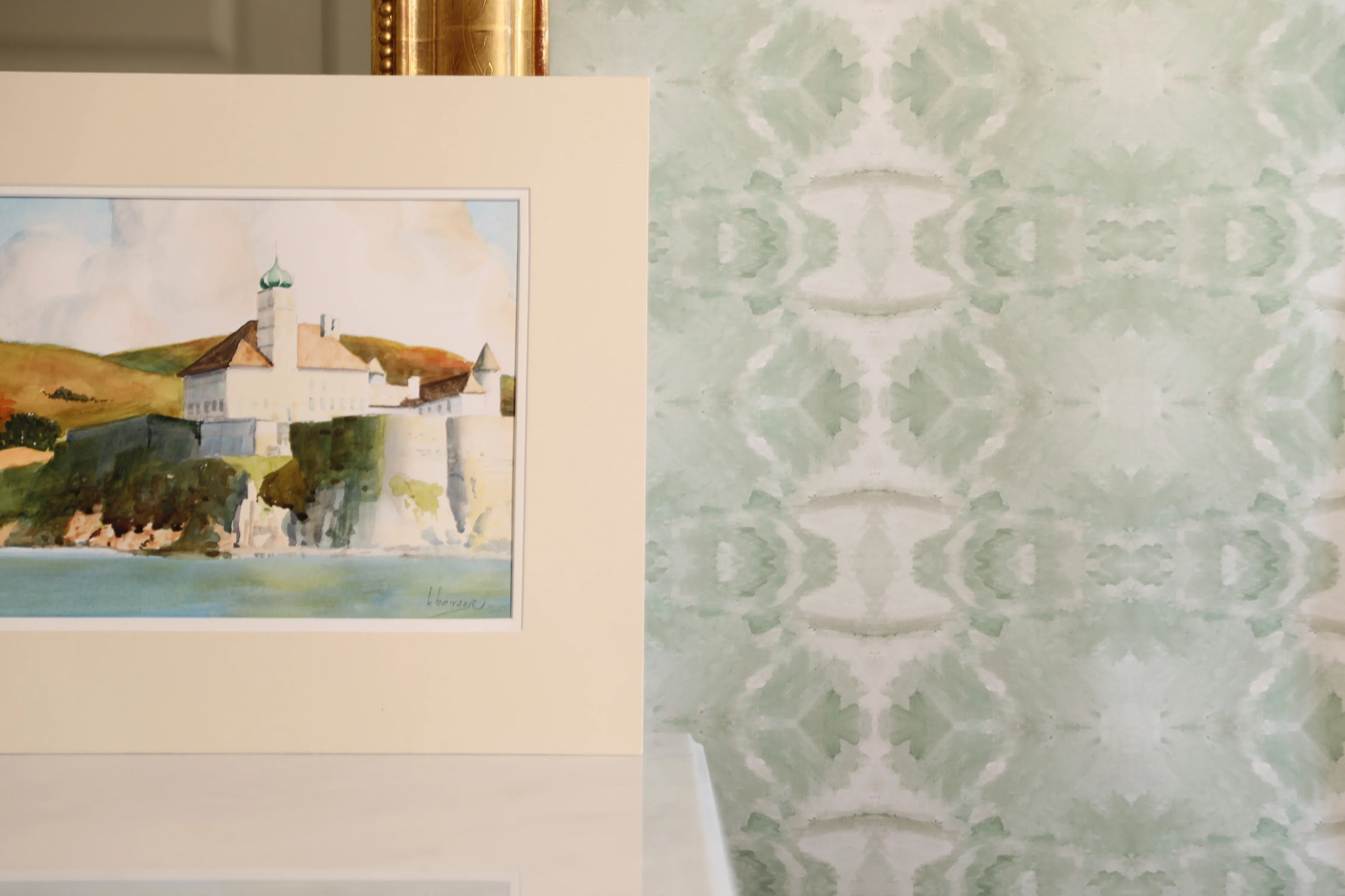 Luxury abstract jade green wallpaper with layered organic movement inspired by live oak trees, ideal for modern traditional interiors, luxury bedrooms, powder rooms, dining spaces, and collected contemporary homes. Sustainably printed in England by Truett Designs.