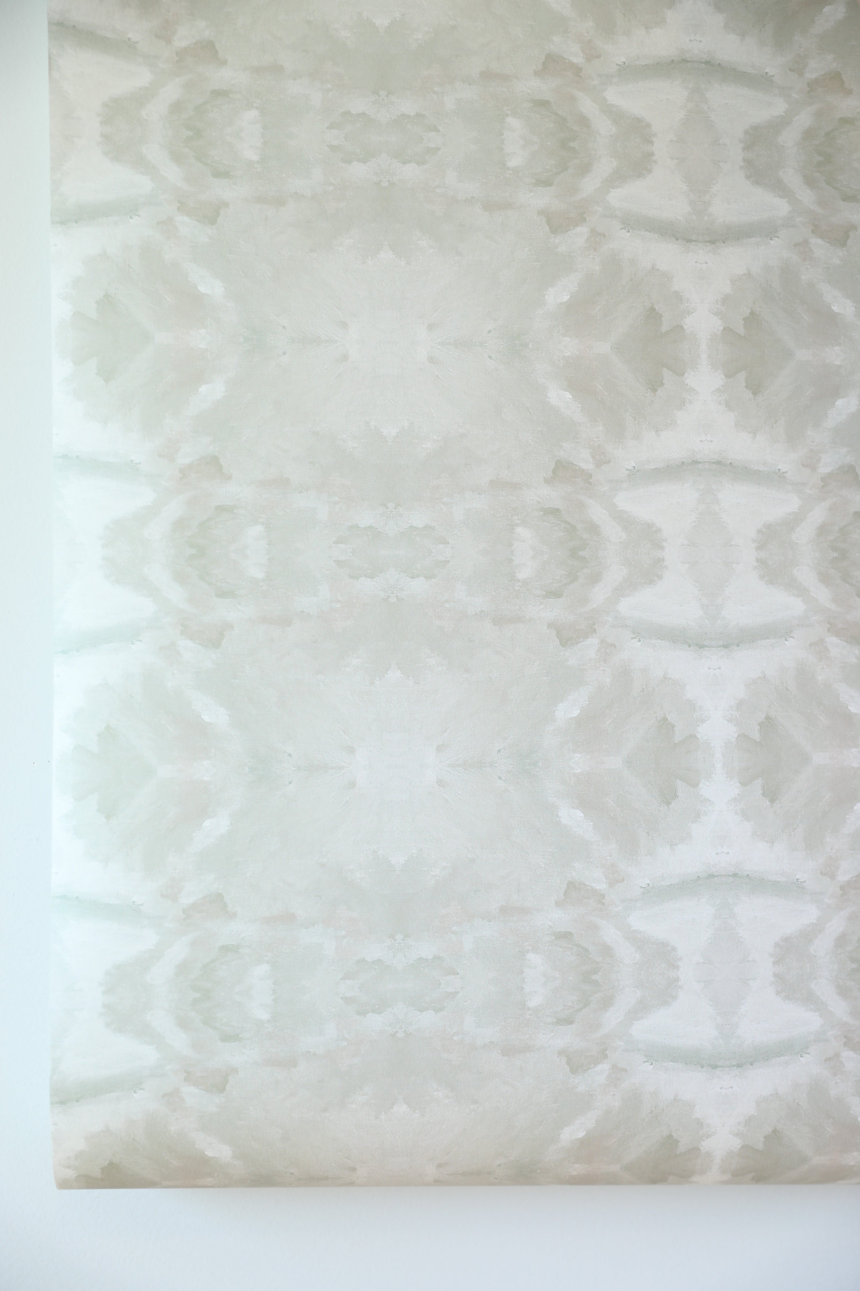 luxury abstract neutral wallpaper in soft putty tones with layered organic movement inspired by live oak trees, designed for modern traditional interiors, luxury bedrooms, powder rooms, dining spaces, and collected contemporary homes. Sustainably printed in England by Truett Designs.