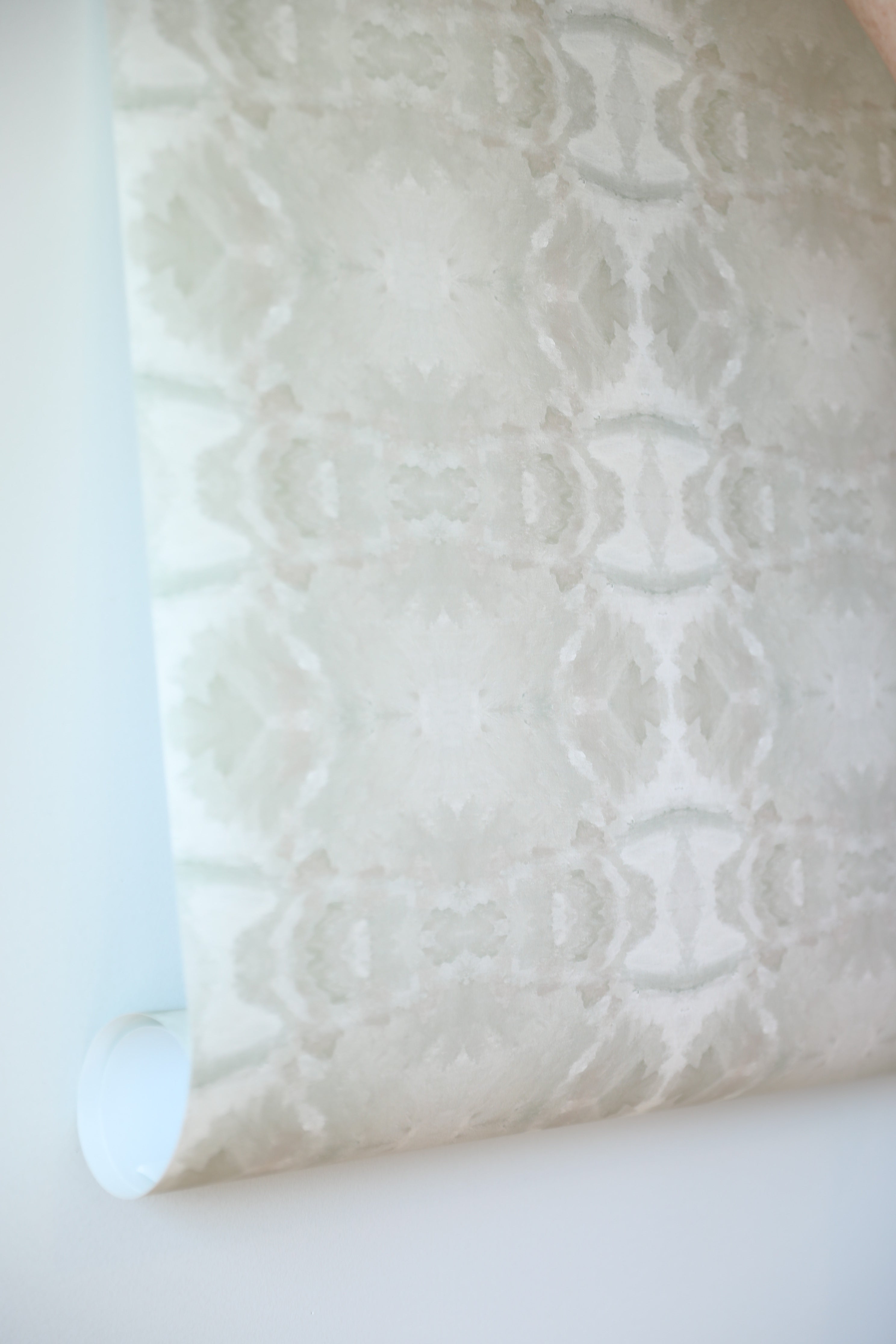 luxury abstract neutral wallpaper in soft putty tones with layered organic movement inspired by live oak trees, designed for modern traditional interiors, luxury bedrooms, powder rooms, dining spaces, and collected contemporary homes. Sustainably printed in England by Truett Designs.