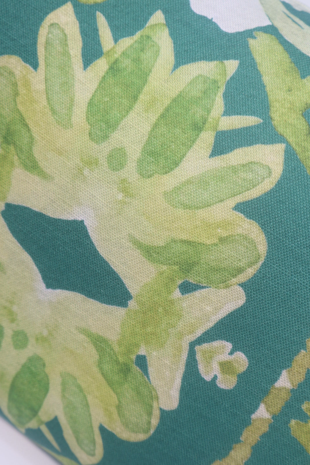 Wildflowers I Dark Green luxury pillow featuring a large-scale abstract floral pattern in rich green tones, handcrafted in England for layered designer interiors, luxury living rooms, and thoughtfully curated home