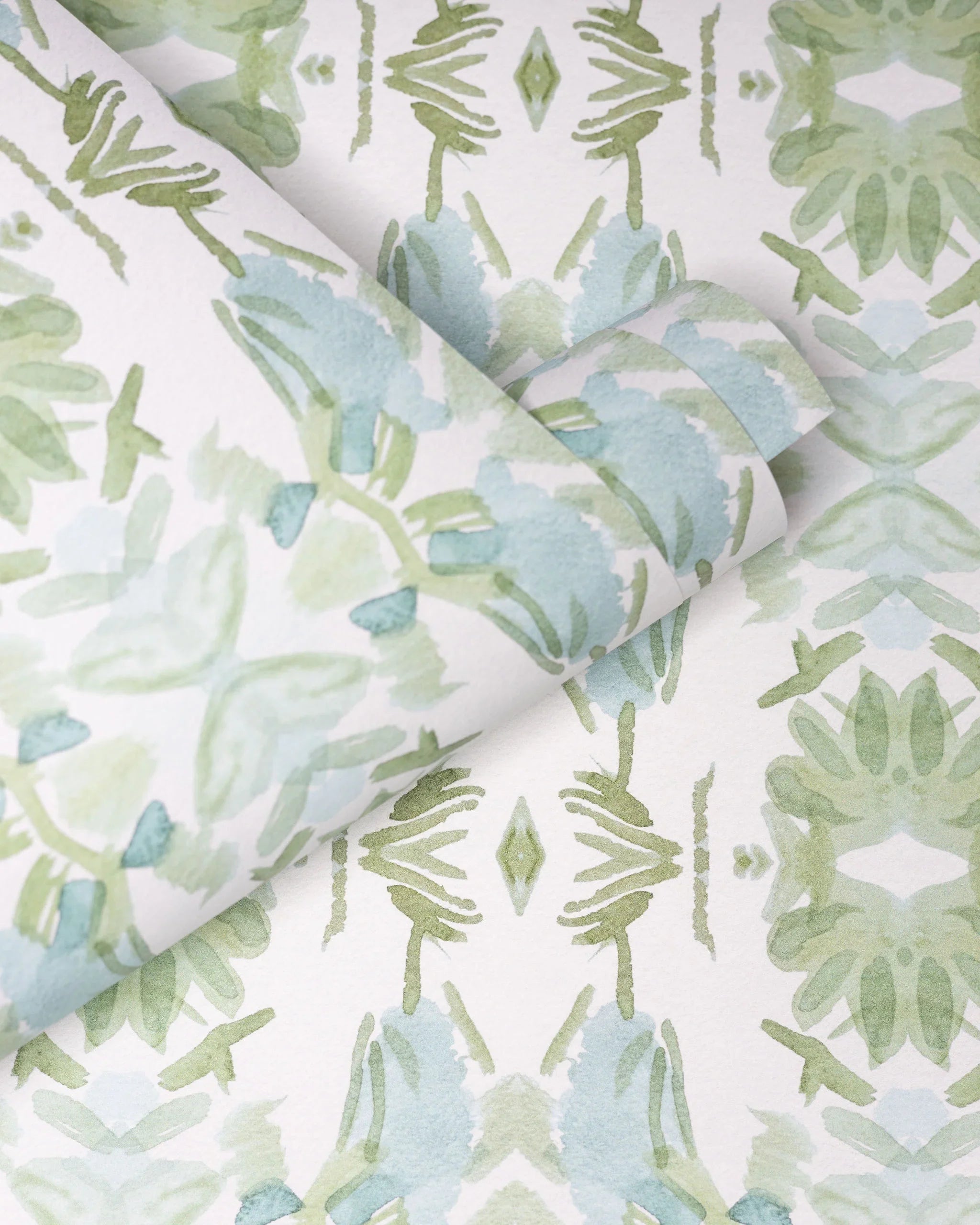 Luxury botanical wallpaper featuring an artistic wildflower-inspired pattern in sage green and soft blue, designed for modern traditional interiors, powder rooms, bedrooms, dining rooms, and collected homes.